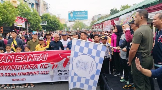 Menyambut HUT BHAYANGKARA Ke 77 Polres OKU Adakan Jalan Santai Dan Lomba Tarik Mobil ACW Polres OKU