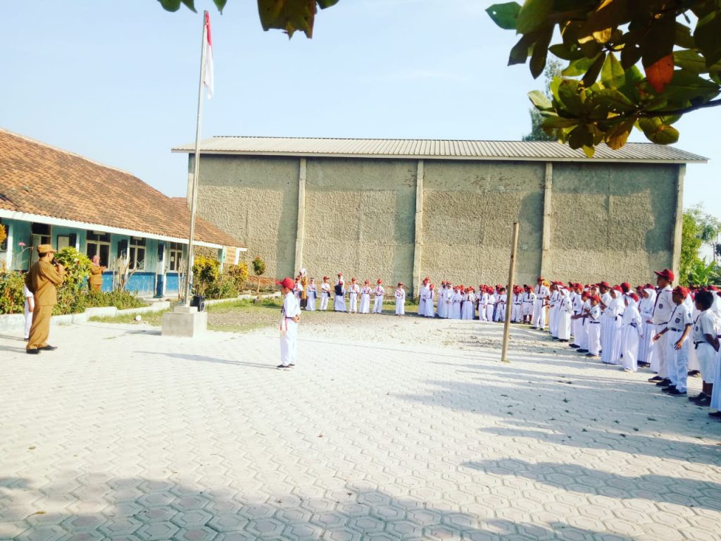 KORWIL PENDIKAN PATOK BESI MEMIMPIN UPACARA