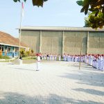 KORWIL PENDIKAN PATOK BESI MEMIMPIN UPACARA