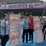 Tim Relawan Nasional Pusat PAS-GIBRAN Mengapresiasi Kegiatan jalan Santai di Kota Makassar.