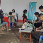 Kapolsek Mapanget Dampingi Tim Kesehatan Polresta Manado dalam Bakti Sosial di Kelurahan Paniki Bawah