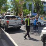 Sat Lantas Lakukan Pengaturan Lalu Lintas untuk Meningkatkan Keamanan di Jalan Raya