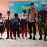 Kapolsek Blanakan berserta tem Trauma Healing Kementerian PPA lakukan Trauma Healing untuk Anak-Anak Sd Jayamukti Kec Blanakan