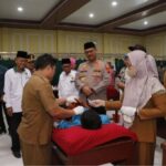 Polres Langkat melaksanakan bakti sosulial Khitanan massal dalam Rangka Hut Bhayangkara ke 79